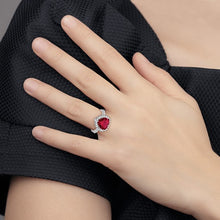 Load image into Gallery viewer, Sterling Silver Rhodium-plated 100 Facet Lab Created Ruby and Brilliant-cut White CZ Heart Halo Ring, Size 6-8
