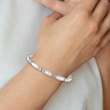 Load image into Gallery viewer, Sterling Silver Rhodium-plated Baguette and Round CZ 7&quot; Bracelet
